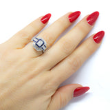 Platinum Emerald Cut Diamond and French cut Sapphire Engagement Ring